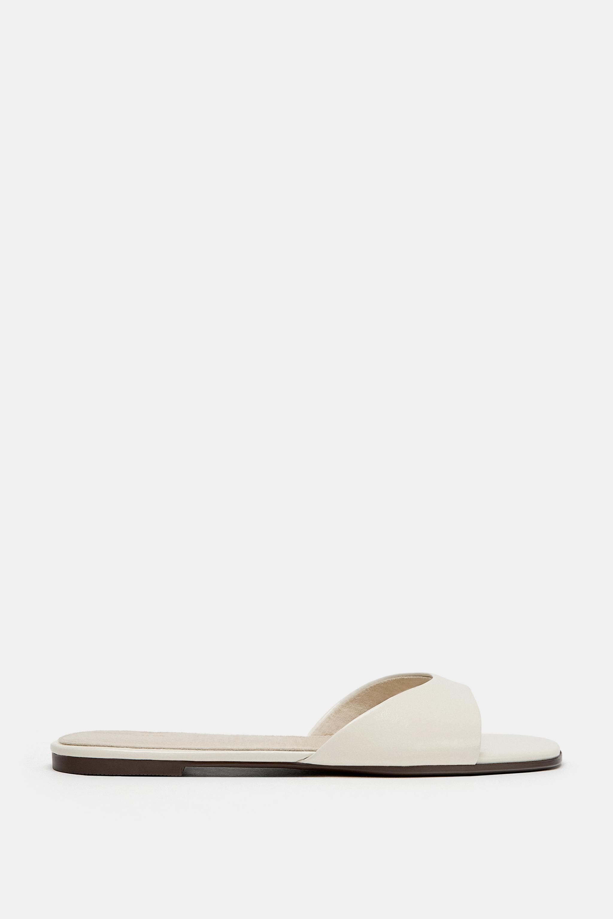 SANDALES PLATES EN CUIR